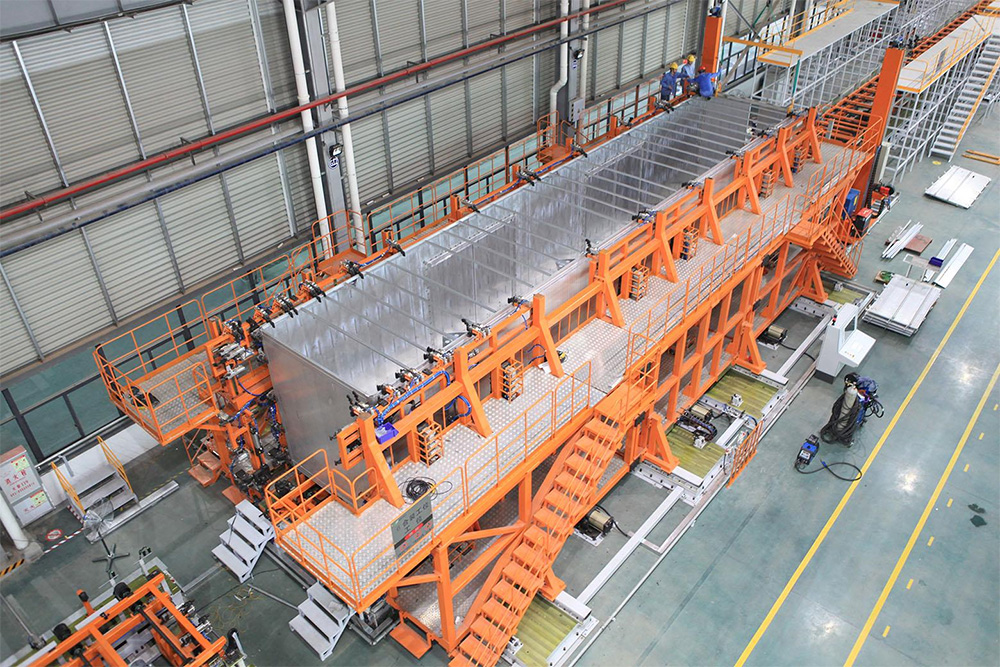 1616725325729538.jpg 1000鋁合金車廂生產(chǎn)線案例現(xiàn)場2.jpg